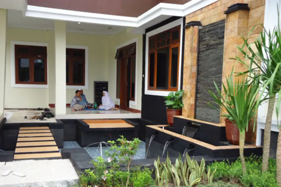 dinding kolam ikan batu pacitoroso