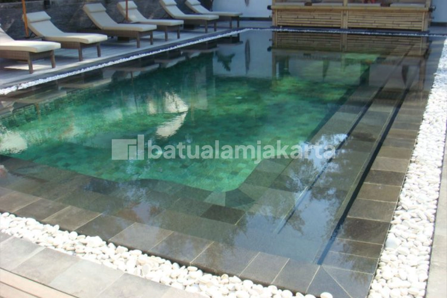 Lantai Kolam Renang batu andesit bintik bakar