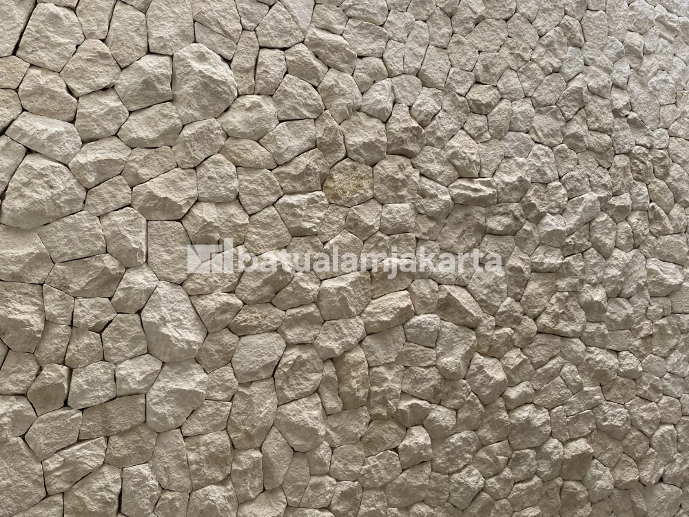 pemasangan batu limestone untuk dinding void - ciputat timur, tangerang selatan
