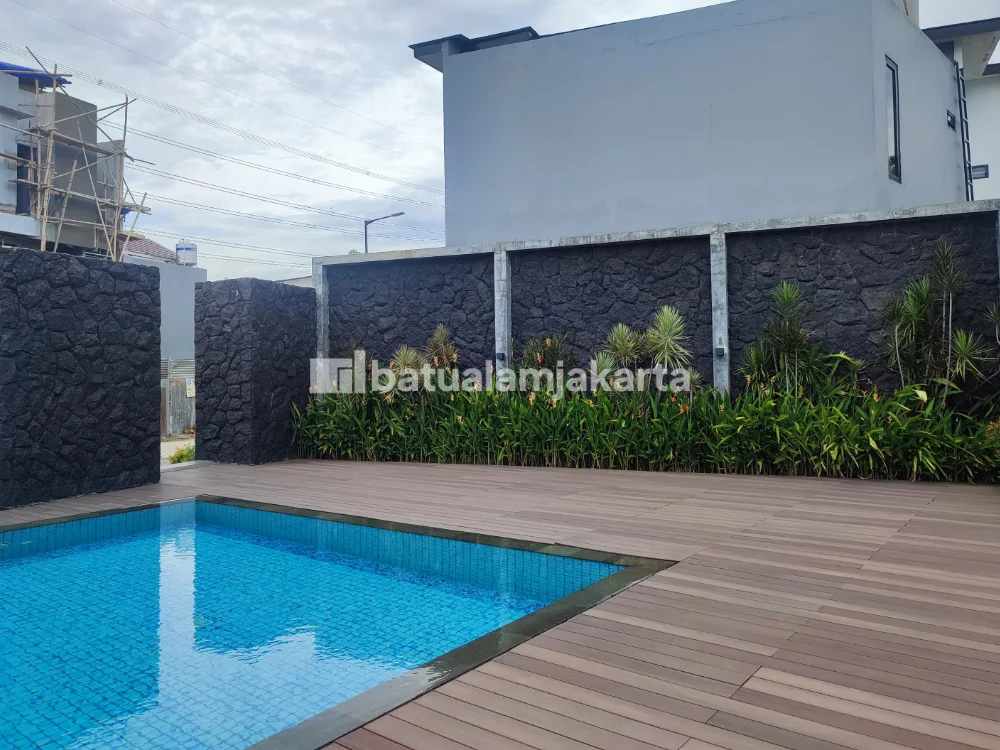 dinding background kolam renang batu alam candi acak