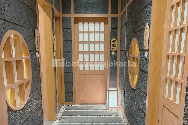 batu andesit untuk dinding kafe resto
